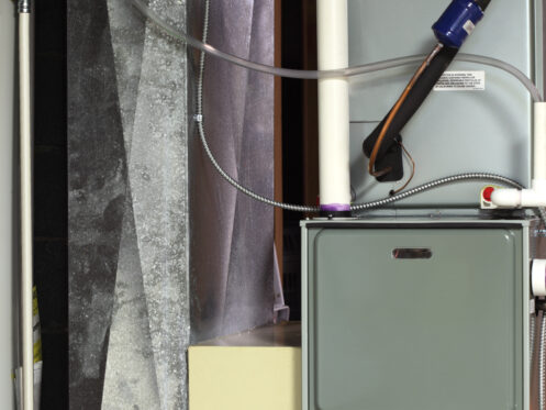 Furnace and ductwork in an O'Fallon basement