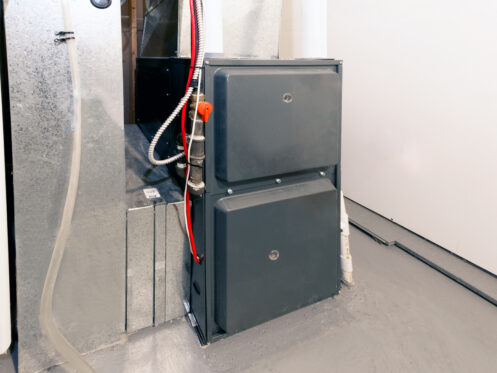 A home high energy efficient furnace in an O'Fallon basement